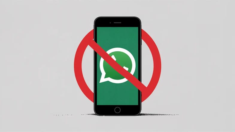 Smartphone com logotipo do WhatsApp e símbolo de proibição vermelho sobre fundo branco.